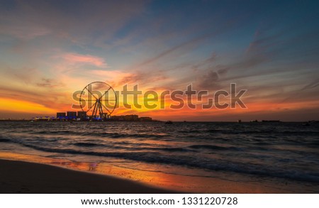 Dramatic sunset over the Bluewaters Island, Dubai, UAE. Сopy space