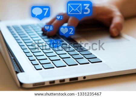 Man is using laptop with black keys, Social media and social networking. Marketing concept