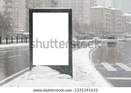 Billboard on street in winter 