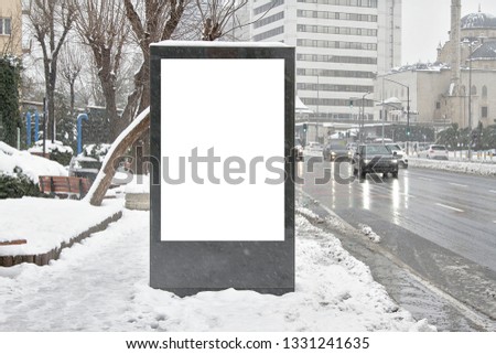 Billboard on street in winter 