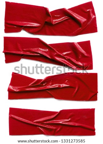 Torn red sticky tape on white background. Set of red tapes on white background. Red duct repair tape isolated on white background.