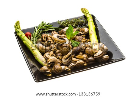 Escargot with asparagus, rosemary, thymus and tomato