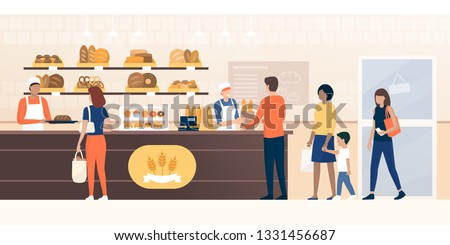People shopping in the bakery and shop assistants working and selling fresh bread to the customers Royalty-Free Stock Photo #1331456687