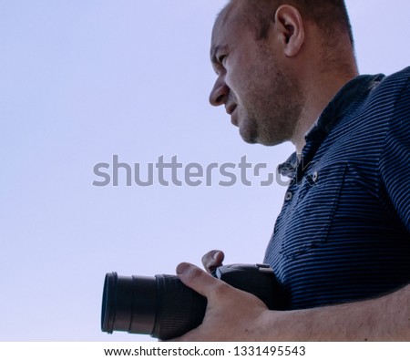 man with a camera