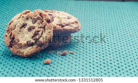 couple of fresh cookies in a good carpet  Royalty-Free Stock Photo #1331512805