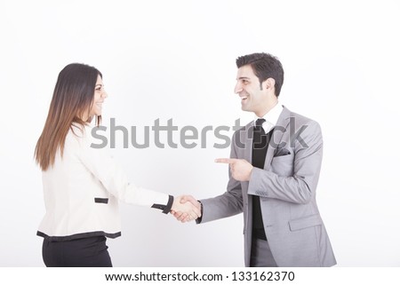 business partners shaking hands. studio shot on a white background.