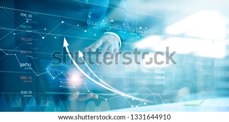 
Businessman using tablet analyzing sales data and economic growth graph chart. Business strategy. Abstract icon. Stock market. Digital marketing.