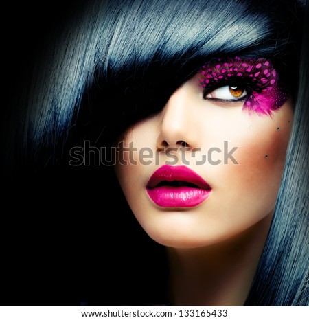 Fashion Brunette Model Portrait. Hairstyle. Haircut. Professional Makeup. False Eyelashes. Purple Make-up