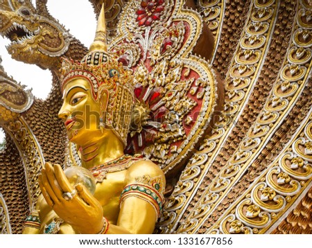 The Golden Statue of The Angel in The Nine Headed Serpent in The Temple