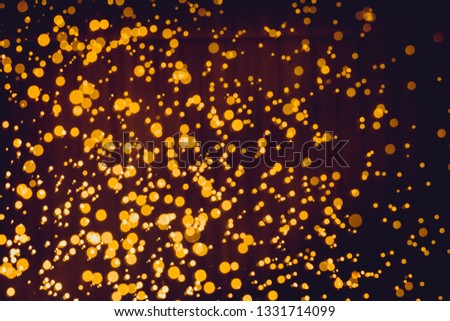 Beautiful gold bokeh of water with black background