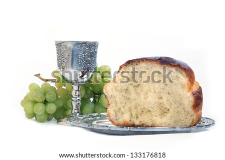 Holy Communion. Bread and cup with wine