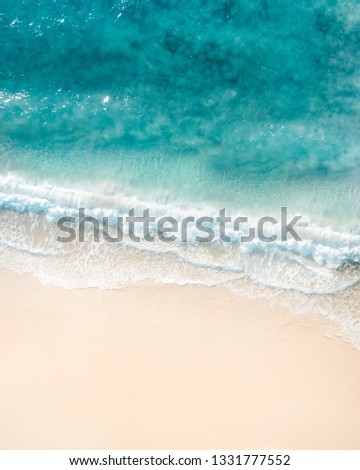 Beach holidays pictures Drone views of beach, waves, surf, swimmer, sea, ocean in Australia. Beautiful aerial of coastal images. - Image

