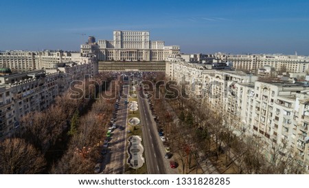 City scape with a busy boulevard on a sunny day Royalty-Free Stock Photo #1331828285
