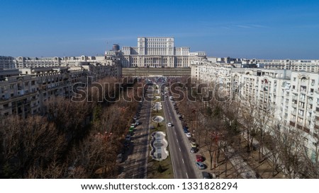 City scape with a busy boulevard on a sunny day Royalty-Free Stock Photo #1331828294