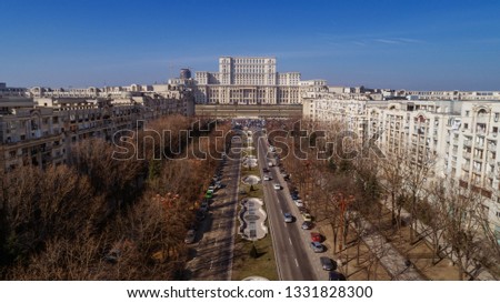 City scape with a busy boulevard on a sunny day Royalty-Free Stock Photo #1331828300