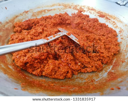 Spices of Thai food that are fried in a pan Is an appetizing orange.To be used as a raw material for cooking many Thai dishes. 