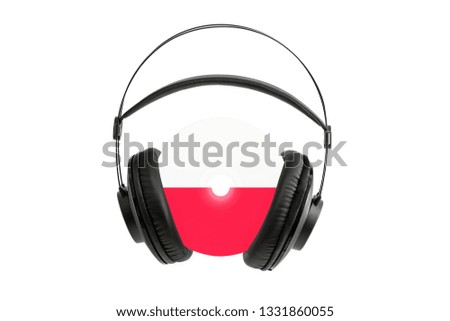 Photo of a headset with a CD with the flag of Poland