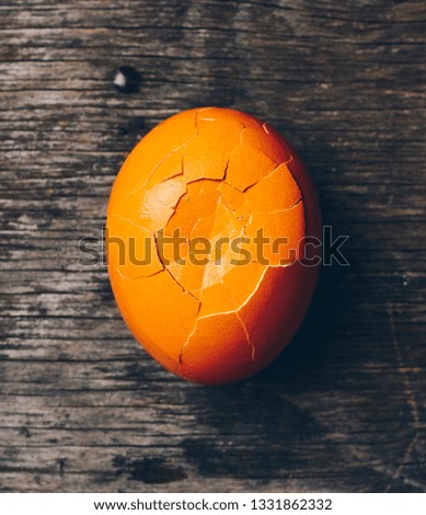Boiled egg on wooden background