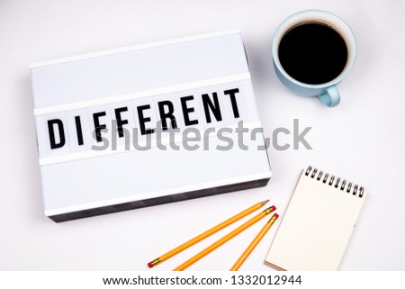 Different. Text in lightbox. White desk with stationery