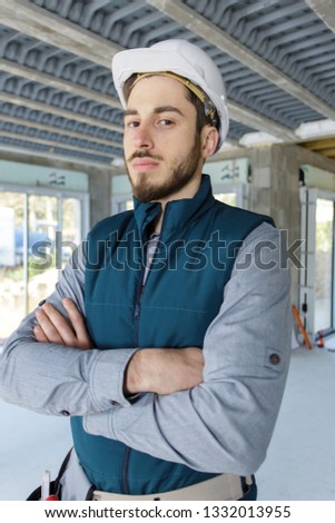 portrait of serious thoughtful construction engineer