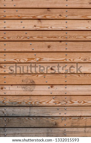 Board wall with rivets