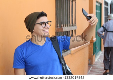 Narcissist young male taking a selfie 