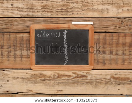 vintage chalkboard menu, free space for your copy, with old wooden background