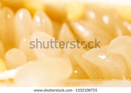 The flesh of the fruit is pomelo as a background. Macro