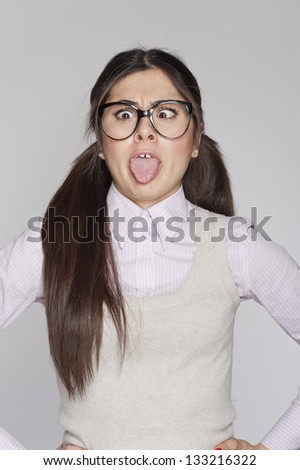 Young nerd woman crazy expression on white background