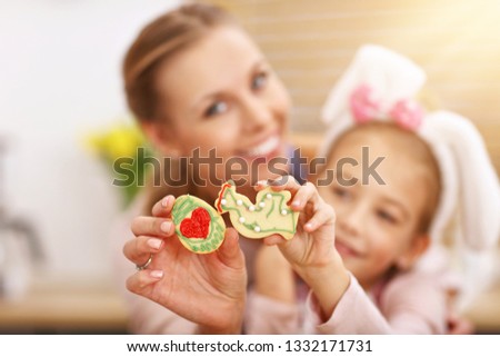 Picture of mother and daughter preparing cookies in the kitchen