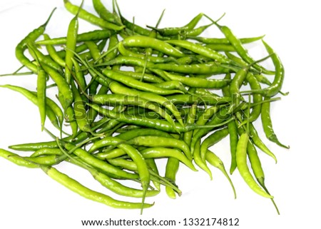 green chilli heap Royalty-Free Stock Photo #1332174812