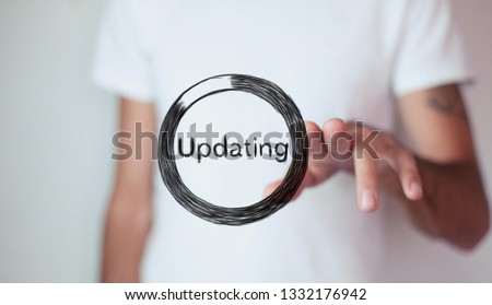 Businessman holding and touching loading sketch