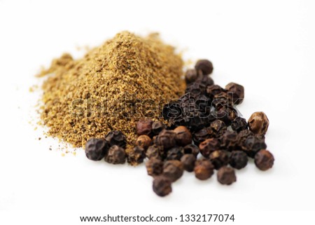 Black Pepper Seeds With Powder Royalty-Free Stock Photo #1332177074