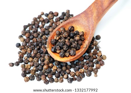 Black Pepper Seeds In the spoon Royalty-Free Stock Photo #1332177992