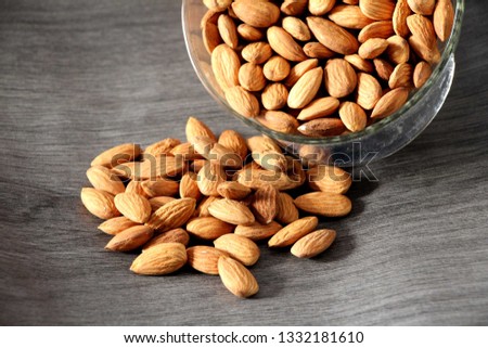 Almond seeds heap Royalty-Free Stock Photo #1332181610