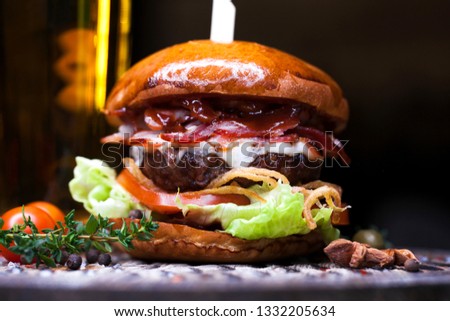 Fast food closeup with traditional tasty hamburger