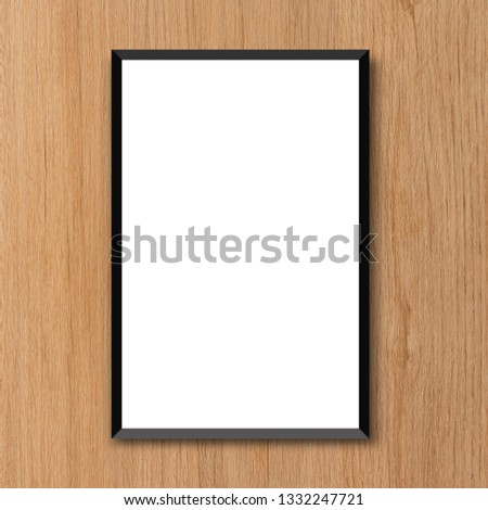 mock up white poster frame on modern brown wood carpentry background texture for design and decorate interior concept