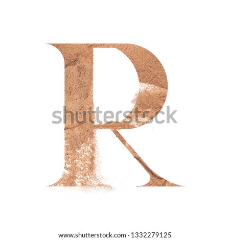 Sand alphabet, letters of sand isolated on white background. Top view. 