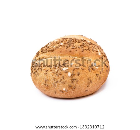 Crispy bun sprinkled with caraway isolated on white background