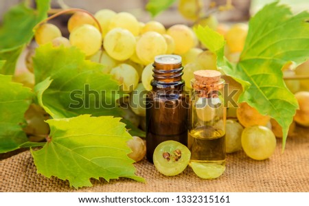 grape seed extract in a small jar. Selective focus. Royalty-Free Stock Photo #1332315161