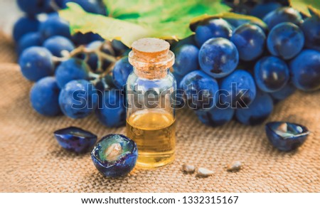 grape seed extract in a small jar. Selective focus. Royalty-Free Stock Photo #1332315167