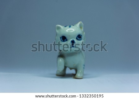 Tiny kitten statue