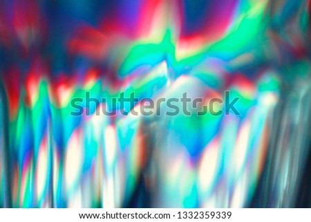Light pass through glass surface causing diffraction and interference 
effect. Concept of electro-magnetic wave energy. Royalty-Free Stock Photo #1332359339