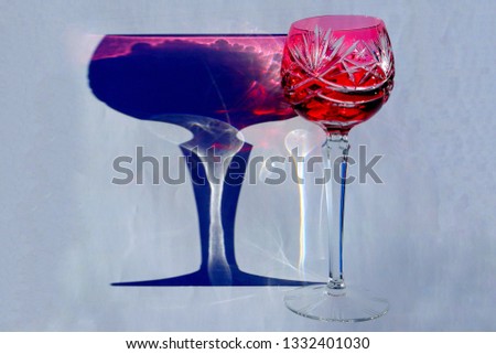 Cool drinking wine glasses known as rummers in sunlight showing a colorful shadow which looks artistic and beautiful