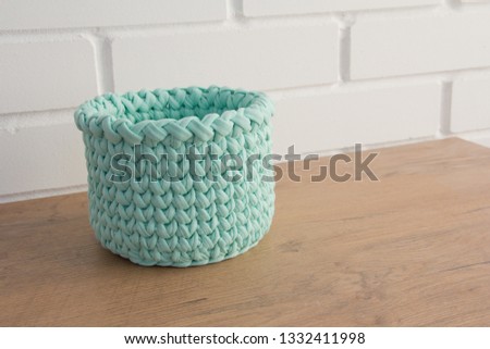 Basket from fabric. Part of the design of the apartment.