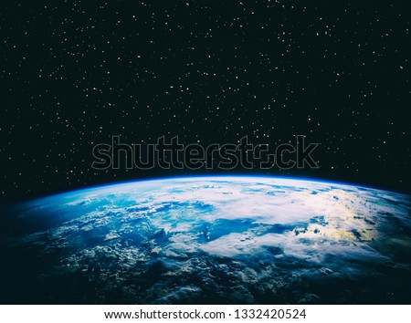 Earth and stars. Blue earth. Great for background.  The elements of this image furnished by NASA.

