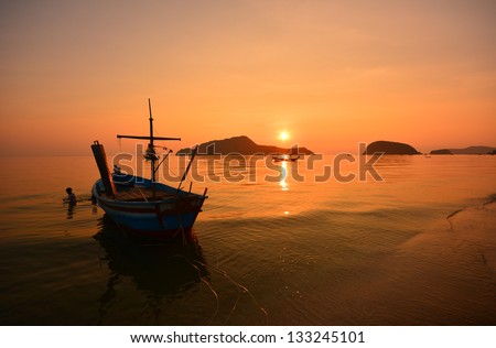 Beach at Sunrise and Boat