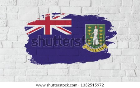 Virgin Islands UK flag on the wall.