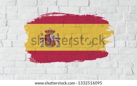 Spain flag on the wall.