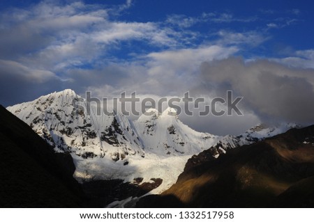 The Huayhuash mountain range in a beautiful picture of the Peruvian Andes.
 
